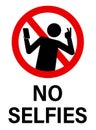 No selfies, ban sign with silhouette of person taking a selfie. Text