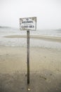 No Shellfishing sign on beach in Chatham, Massachusetts on Cape Cod.