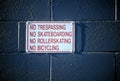 No Sign No Trespassing on a Brick Wall
