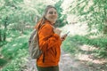No signal cellphone network. No communication coverage, lost contact signal device. Sad woman tourist hiker hand holding Royalty Free Stock Photo