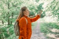 No signal cellphone network. No communication coverage, lost contact signal device. Sad woman tourist hiker hand holding Royalty Free Stock Photo