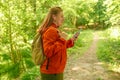 No signal cellphone network. No communication coverage, lost contact signal device. Sad woman tourist hiker hand holding Royalty Free Stock Photo