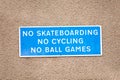 No skateboarding cycling or ball games sign on private property wall Royalty Free Stock Photo