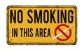 No smoking in this area vintage metal sign Royalty Free Stock Photo