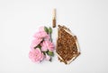 No smoking concept. Lungs made of dry tobacco, cigarettes and pink flowers on white background, flat lay Royalty Free Stock Photo