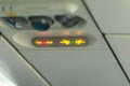 No Smoking and Fasten Seat belt Sign Inside an Airplane. Fasten Royalty Free Stock Photo