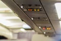 No Smoking and Fasten Seat belt Sign Inside an Airplane. Fasten Royalty Free Stock Photo