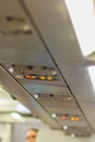 No Smoking and Fasten Seat belt Sign Inside an Airplane. Fasten Royalty Free Stock Photo