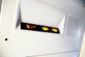 No Smoking and Fasten Seat belt Sign Inside an Airplane Royalty Free Stock Photo