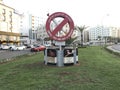 No smoking sign board fixed in between the roads at the lawn for public awareness by the Ministry of health department
