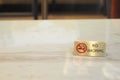 No smoking sign on a marble table in a restaurant Royalty Free Stock Photo