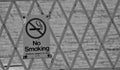 No Smoking Sign Posted On Front Of Fence Royalty Free Stock Photo