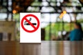 No smoking sign with shopping place background on wooden table Royalty Free Stock Photo