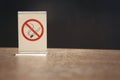 No smoking sign symbol on wooden table Royalty Free Stock Photo