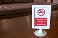 No smoking sign on a table in a cafe. Royalty Free Stock Photo