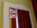 No smoking sticker on a mirror in a hotel room