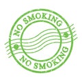 NO SMOKING, text written on green postal stamp