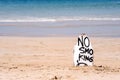 No Smoking warning sign on white surfboard at the beach in summer, concept of sea environmantal protection design, copy space, Royalty Free Stock Photo