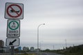 No snowmobile and Shared Pathway sign along 48th street in Yellowknife, Canada Royalty Free Stock Photo