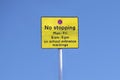 No stopping outside school road safety sign keep clear against blue sky Royalty Free Stock Photo