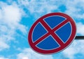 No stopping road sign against a blue sky Royalty Free Stock Photo