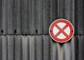 No stopping sign on asbestos wall Royalty Free Stock Photo