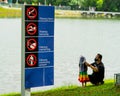 No Swimming, No Fishing, Don&#x27;t Litter And No Diving Signboard Near The Lake Written In Malaysian Language