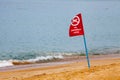 No swimming here red flag on the beach Royalty Free Stock Photo