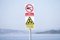 No swimming sign in motorised craft area at beach and sea Royalty Free Stock Photo