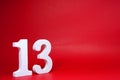 No. 13  thirteen  Isolated red  Background with Copy Space - Lucky or unlucky Number 13% Percentage or Promotion - Discount or a Royalty Free Stock Photo