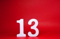 No. 13  thirteen  Isolated red  Background with Copy Space - Lucky or unlucky Number 13% Percentage or Promotion - Discount or a Royalty Free Stock Photo