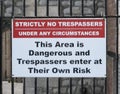 No Trespassers sign on old metal railings, United Kingdom