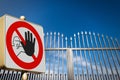 No Trespassing or Do Not Enter Road Sign and a Closed Gate Royalty Free Stock Photo