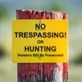 No Trespassing sign on an old fence post Royalty Free Stock Photo