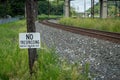 No Tresspassing Sign along Railroad Royalty Free Stock Photo