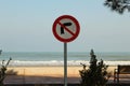 No turning right sign near beach
