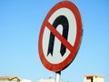 No U-turn sign, a regulatory sign posted at intersections to indicate the driver is not legally allowed to make a U-turn