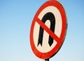 No U-turn sign, a regulatory sign posted at intersections to indicate the driver is not legally allowed to make a U-turn