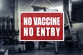 No Vaccine No Entry Sign at a gym or fitness club. Proof or vaccination required to enter a shop or business establishment