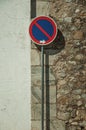 NO WAITING road sign in front of plaster and stone wall at Elvas