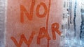 No war message on fogged window. Pacifist text, anti war concept.