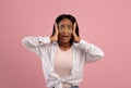 No way. Shocked black woman grasping her head in disbelief over pink studio background Royalty Free Stock Photo