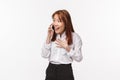 No way, wow. Surprised pleased happy smiling asian woman talking on mobile phone, laughing astonished and cheerful, hear Royalty Free Stock Photo
