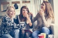 On no, you are been feet. Young women having fun together. Royalty Free Stock Photo