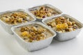 Noah`s Puddings in Foil Containers,`take away` on white Royalty Free Stock Photo