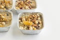 Noah`s Puddings in Foil Containers,`take away` on white Royalty Free Stock Photo