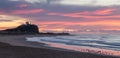 Nobbys Beach and Lighthouse at morning sunrise - Newcastle NSW Australia Royalty Free Stock Photo