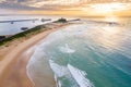 Nobbys Beach and Newcastle Harbour Ship leaving port - aerial view