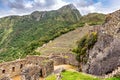 Houses and terraces in Incas city of Machu Picchu in Peru Royalty Free Stock Photo