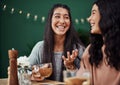 Nobody gets you like your sister gets you. young sisters spending quality time at a cafe.